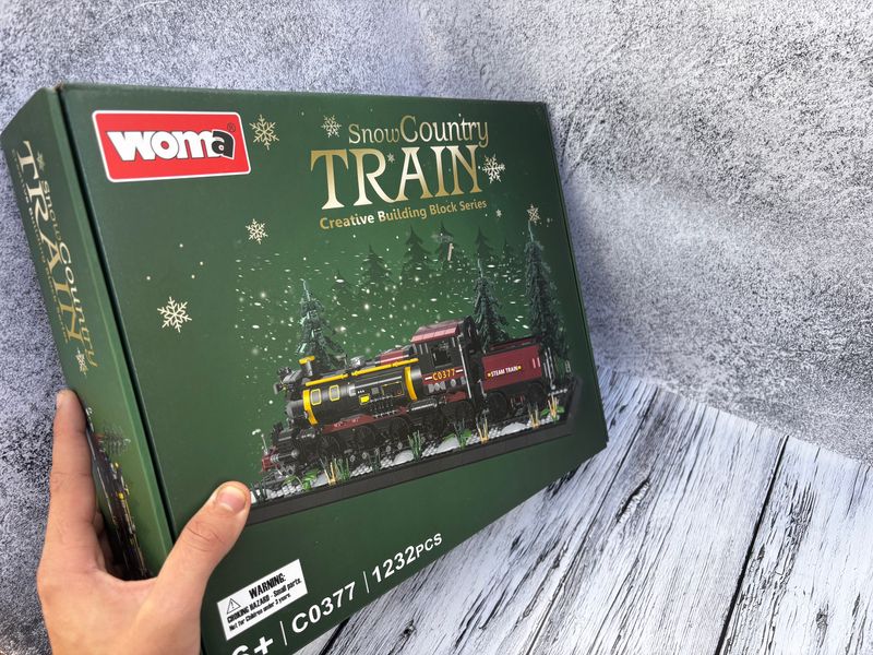 Конструктор поезд Snow Counrty TRAIN розивающий WOMA 1232 деталей